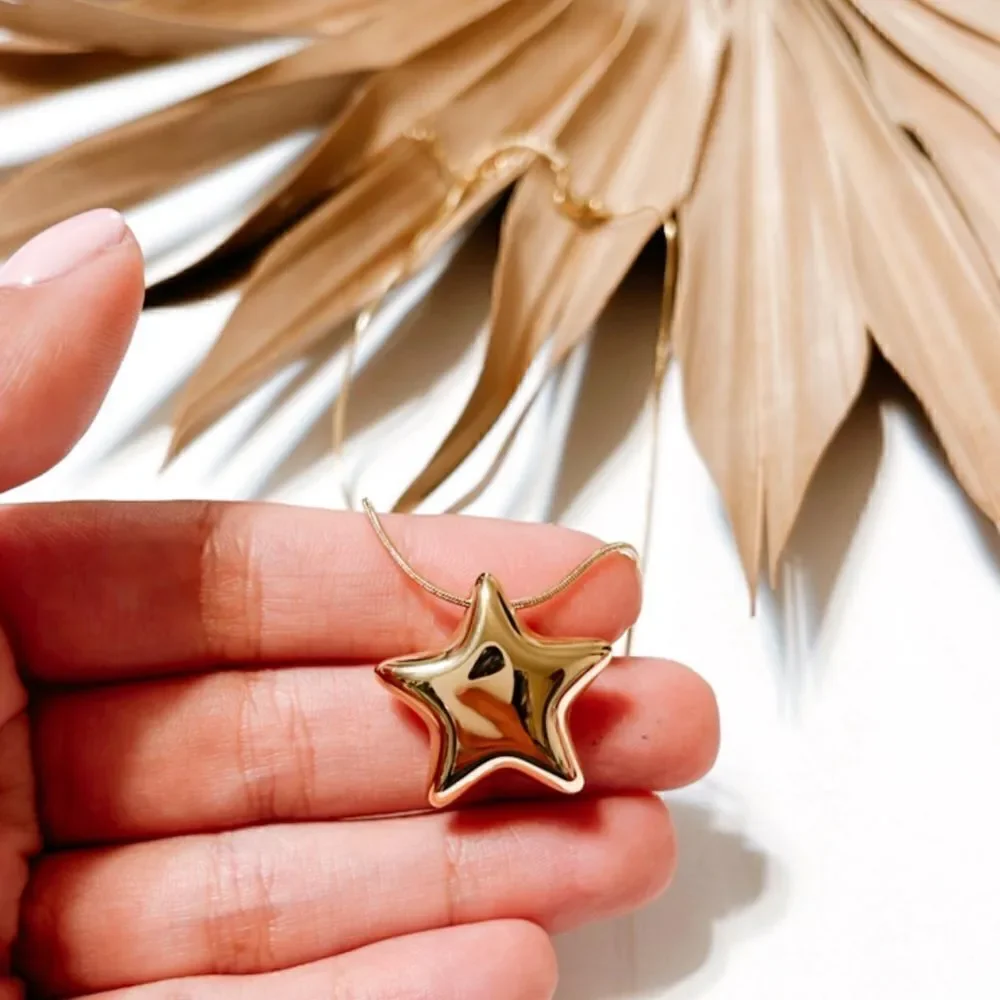 Anthropologie star pendant